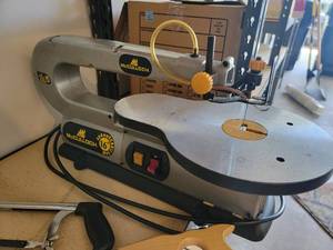 lot 28 image: Tool Collection- Mcculloch 16 Scroll Saw,Bow Saw, 2 Hand Saws