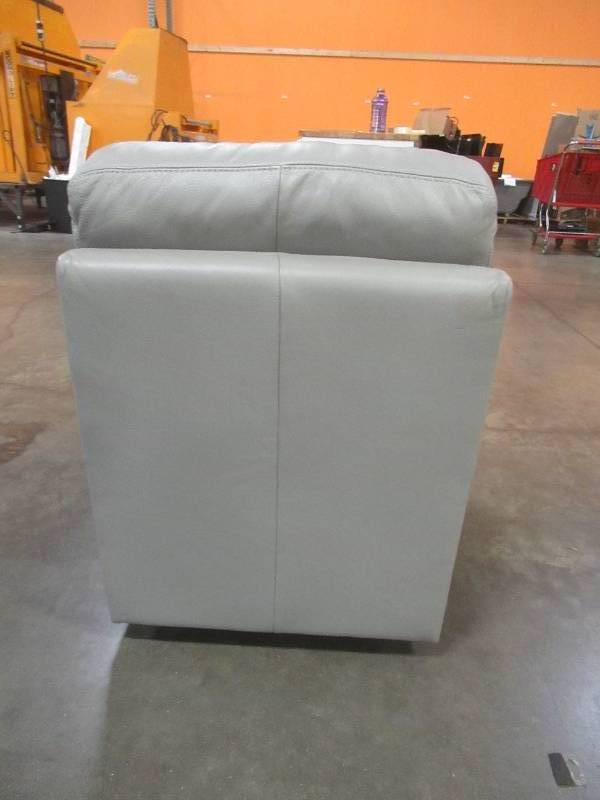 lot 452 image: CREATED FOR MACYs MAGNUS FURNITURE Sectional Sofa Single Leather Chair in Valencia Grey (Chair Only). In Like New Condition Approximate Dimensions 23 x 35 x 28 Tall.