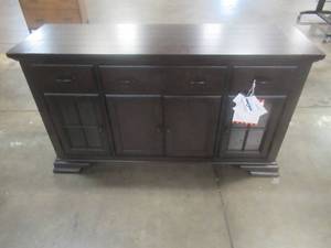 lot 128 image: CREATED FOR MACYs LEGACY CLASSIC FURNITURE Solid Wood Buffet 4 Doors (The 2 Side Glass Doors Have internal Lighting), Adjustable Shelves, 3 Drawers With Velvet Inlays. Approximate Dimensions 62 x 19 x 36 Tall. In Like New Condition.