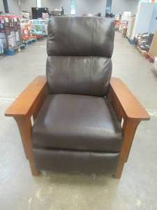 lot 142 image: CREATED FOR MACYs J-HOME FURNITURE Leather Manual Recliner With Wood Frame.