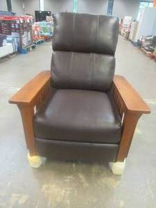 lot 143 image: CREATED FOR MACYs J-HOME FURNITURE Leather Manual Recliner With Wood Frame.