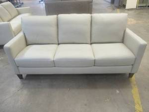 lot 156 image: CREATED FOR MACYs VIOLINO FURNITURE, Leather Sofa in Cream. Approximate Dimensions 80 x 36 x 31 Tall.