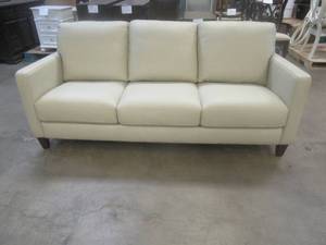 lot 157 image: CREATED FOR MACYs VIOLINO FURNITURE, Leather Sofa in Cream. Approximate Dimensions 80 x 36 x 31 Tall.