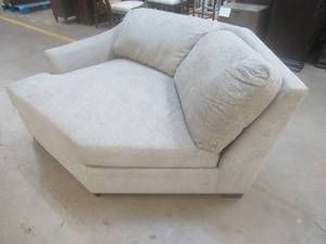 lot 164 image: CREATED FOR MACYs BAUHAUS FURNITURE, Large Upholstered Left Arm Facing Chair, (Sectional Piece) in Light Grey. Approximate Dimensions 69 x 56 x 31 Tall.