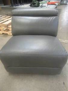 lot 165 image: CREATED FOR MACYs JASON FURNITURE, Leather Center Chair, (Sectional Piece) With Manual Flip-Up Headrest in Dark Grey. Approximate Dimensions 34 x 40 x 32 Tall.