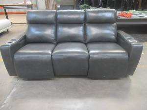 lot 167 image: CREATED FOR MACYs TIMBERLAND FURNITURE, Powered Leather Reclining Sofa in Dark Gray. Approximate Dimensions 84 x 34 x 36 Tall.