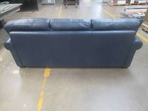 lot 180 image: CREATED FOR MACYs PALLISER FURNITURE, Leather Sofa in Blue (Scuff on Back of Arm). Approximate Dimensions 84 x 36 x 30 Tall.