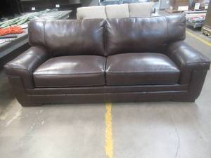 lot 181 image: CREATED FOR MACYs TRAYTON FURNITURE, Leather Sofa in Brown. Approximate Dimensions 88 x 40 x 32 Tall.