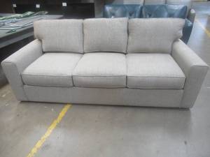 lot 182 image: CREATED FOR MACYs JONATHAN LOUIS FURNITURE, Upholstered Sofa in Light Brown. Approximate Dimensions 86 x 40 x 31 Tall.
