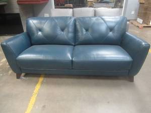 lot 183 image: CREATED FOR MACYs VIOLINO FURNITURE, Leather Sofa in Blue (Scuff on Back Upper Corner). Approximate Dimensions 80 x 36 x 35 Tall.