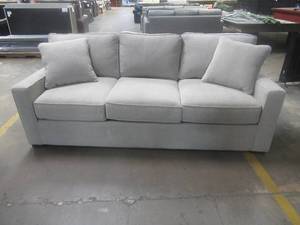 lot 185 image: CREATED FOR MACYs JONATHAN LOUIS FURNITURE, Upholstered Sofa in Beige. Approximate Dimensions 86 x 40 x 30 Tall.