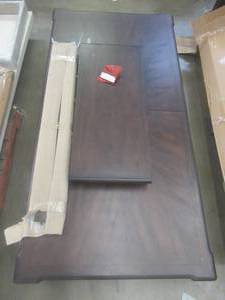 lot 191 image: CREATED FOR MACYs FURNITURE, Solid Wooden Dining Table Top Ony in Mohogany Finish, Corner and Edge Damage (see photos). Approximate Dimensions 82 X 42 X 31 Tall. Leaf is 18.