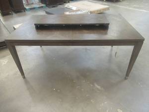 lot 192 image: CREATED FOR MACYs RIVERSIDE FURNITURE, Solid Wooden Dining Table in Mohogany Finish, Slight Corner and Edge DingsScratches (see photos). Approximate Dimensions 72 X 44 X 31 Tall. Leaf is 18.