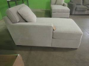 lot 200 image: CREATED FOR MACYs JONATHAN LOUIS FURNITURE, Radley Left Arm Facing Chaise (Part of Sectional) in Heavenly Chrome. Cut in Inside Side of Cushion (See Photos). Approximate Dimensions 63 X 36 X 30 Tall.