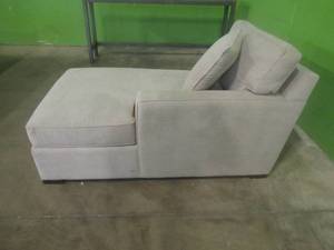 lot 201 image: CREATED FOR MACYs JONATHAN LOUIS FURNITURE, Radley Right Arm Facing Chaise (Part of Sectional) in Heavenly Chrome. Deep Stain on Outside Bottom (See Photos). Approximate Dimensions 63 X 36 X 30 Tall.