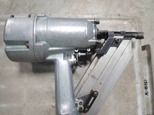 Nail Gun  Brand and model have been worn off  still fully functional  inspection suggested
