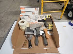 Dry Wall Repair Kit  includes scrapers, wall patches, and sanding blocks
