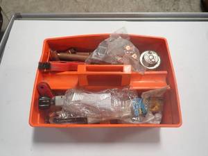 Plumbing Toolbox with Copper pipes and fittings