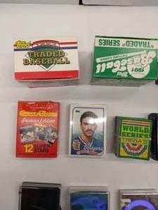 lot 13 image: An Assortment of MLB Baseball Sealed Packs and MLB Baseball Cards from Fleer, Upper Deck, Score, Topps