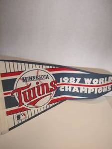lot 12 image: 1987 MLB Minnesota Twins World Series Champions Baseball Pennant Flag Banner and Kirby Puckett Plaque