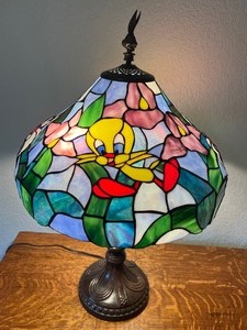 lot 26 image: Fun and Whimsical Tweety Bird & Sylvester Stained Glass Table Lamp