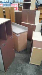 Brown Base And Upper Cabinets.