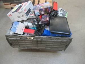 lot 715 image: BIN OF CUSTOMER RETURN ELECTRONICS - INCLUDES VIDEO GAMES, EAR BUDS, STRIP LIGHTS, AUTOMOTIVE ACCESSORIES, ELECTRONIC ACCESSORIES & MORE