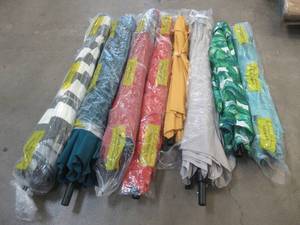 lot 740 image: LOT OF MISC. PATIO UMBRELLAS USED FOR STORE DISPLAYS (MISSING STAKE POLES)
