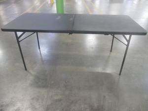 lot 859 image: Folding Table in Black - Slight Scratch and Dent. 72 x 30 x 30 Tall.