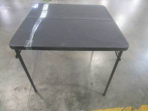 lot 861 image: Folding Card Table in Black - Slight Scratch and Dent, Approximate Dimensions 34 x 34 x 28.