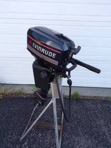 lot 2 image: 4 HP Evinrude 2 Cylinder 2 Cycle Outboard Motor with saddle tank