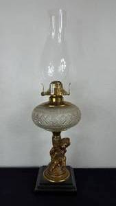 lot 155 image: Antique Kerosene Figural Composite Lamp