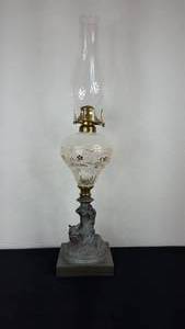 lot 156 image: Antique Kerosene Figural Composite Lamp