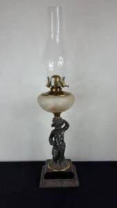 lot 157 image: Antique Kerosene Figural Composite Lamp