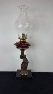 lot 159 image: Antique Kerosene Figural Composite Lamp Ruby Flashed