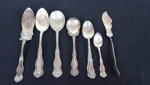 lot 178 image: Banner Buggy Advertising Spoons