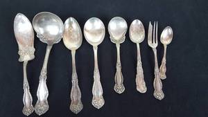 lot 179 image: Banner Buggy Advertising Spoons