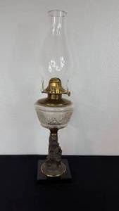 lot 91 image: Antique Kerosene Figural Composite Lamp