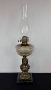 lot 92 image: Antique Kerosene Figural Composite Lamp