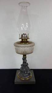 lot 94 image: Antique Kerosene Figural Composite Lamp