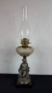 lot 135 image: Antique Kerosene Figural Composite Lamp