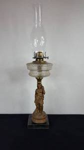 lot 146 image: Antique Kerosene Figural Composite Lamp
