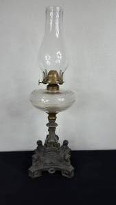 lot 153 image: Antique Kerosene Figural Composite Lamp
