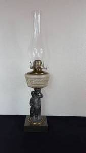 lot 36 image: Antique Kerosene Figural Composite Lamp