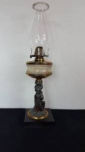 lot 37 image: Antique Kerosene Figural Composite Lamp
