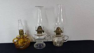 lot 54 image: Candlestick Kerosene Lamps