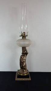 lot 57 image: Antique Kerosene Figural Composite Lamp
