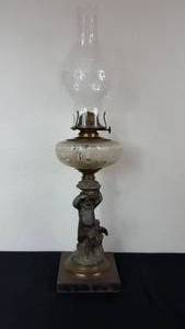 lot 60 image: Antique Kerosene Figural Composite Lamp