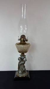 lot 65 image: Antique Kerosene Figural Composite Lamp