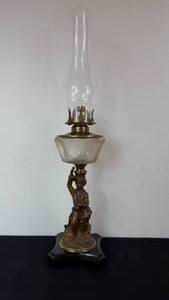lot 66 image: Antique Kerosene Figural Composite Lamp
